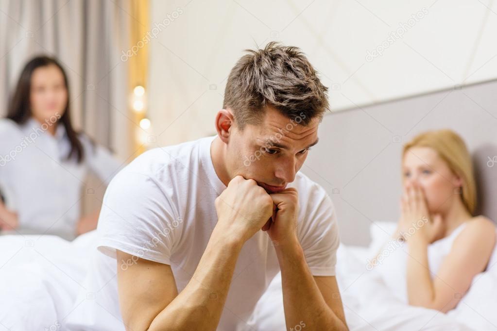 depositphotos 39415915 stock photo man sitting on the bed