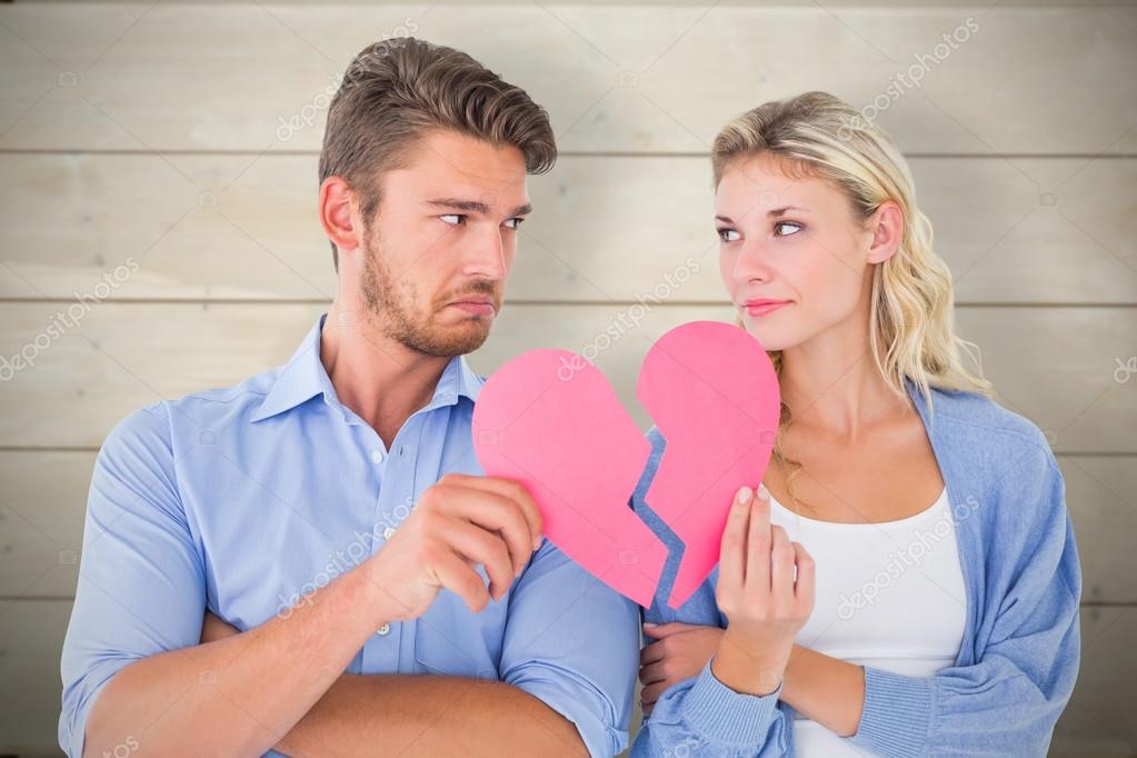 depositphotos 69035295 stock photo couple holding two halves of