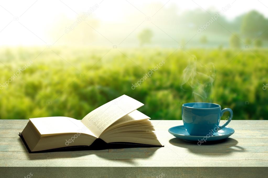 depositphotos 74949611 stock photo open book with a coffee