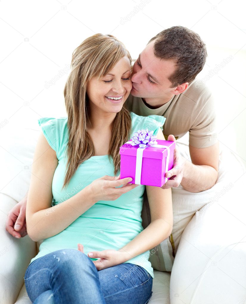 depositphotos 10824660 stock photo attractive boyfriend giving a present