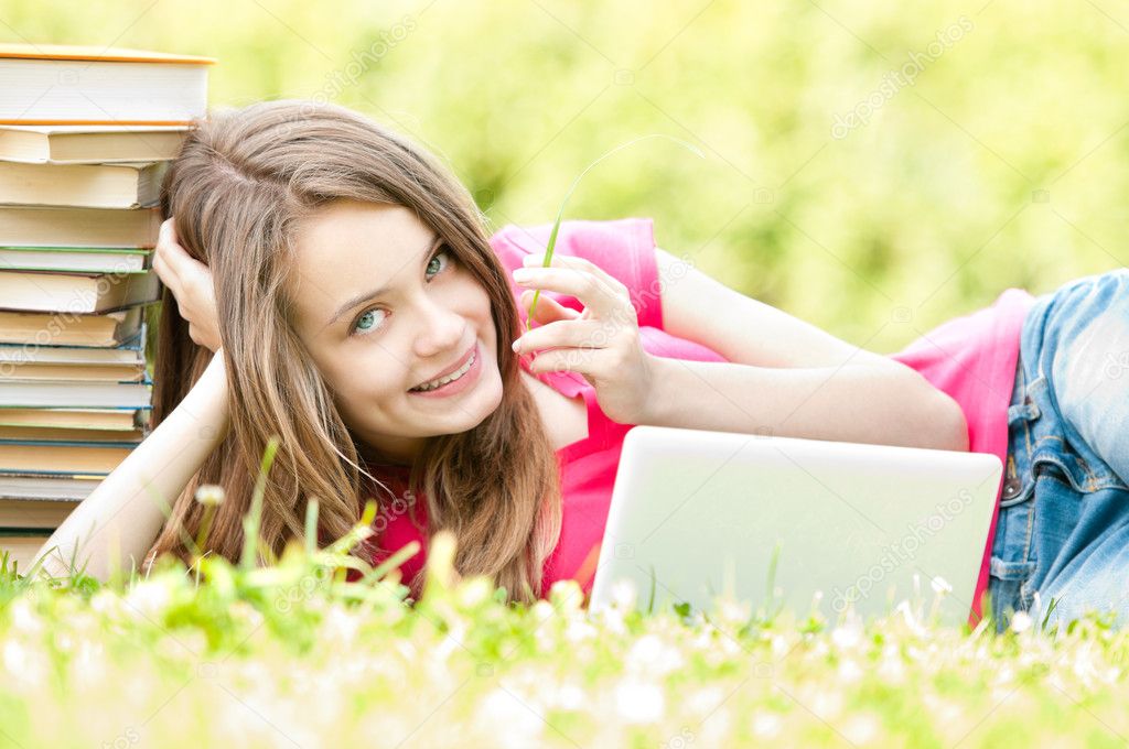 depositphotos 11436676 stock photo happy student girl lying on